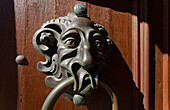 Door knocker at the entrance to the residence, New Residence of the Prince-Bishops of Bamberg, 17th century, historic city center, UNESCO world heritage site, Regnitz river, Bamberg, Upper Franconia, Bavaria, Germany, Europe