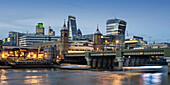 City of London. Financial district office buildings in the City of London, River Thames at Twilight