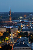 View from Radisson Blue Hotel over the old town at night, liberty monument, St. Petri church, Daugava river, National Library, old town, Riga, Latvia