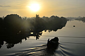 Sunset in An Binh in the delta of Mekong river, Vietnam, Asia
