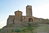 Fort and church in a former mosque on a hill above Almonaster la Real, Sierra de Aracena, Huelva, Andalusia, Spain