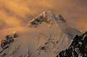 Yerupaja summit ridge, 6617 meters, at sunset, Cordillera Huayhuash, Andes, Peru