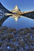 The Matterhorn reflected in the Riffelsee Lake at dusk, Switzerland