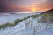 Sunset over the North Sea as seen from the dunes of Ameland, Netherlands