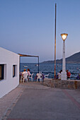 Restaurant at the small harbour in La Isleta in the evening at Cabo de Gata, Almeria province, Andalusia, Spain