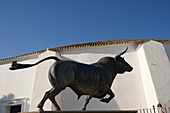 Sculture of a bull in front of the bullfighting arena in Ronda, Malaga province, Andalusia, Spain