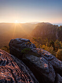 Sunrise over the Saxon Switzerland National Park, with view to the Mittelwinkel in the Schrammstein rock formation in late summer, Saxony, Germany