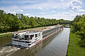 River cruise ship Viking Lif (Viking River Cruises) on Main river, near Volkach, Franconia, Bavaria, Germany