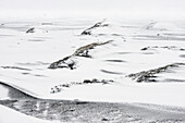 Snow structures and snowy hills in winterly landscape near Hofn, East Iceland, Iceland, Europe