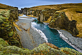 Fjadrargljufur gorge with moos covered canyon walls and river bed of Fjadra, near Kirkjubaejarklaustur, Southern Iceland, Iceland, Europe