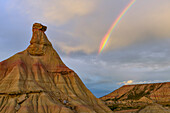 rainbow over Castil de Tierra, El Castildetierra, Bardenas Reales, semi-desert natural region (badlands), UNESCO biosphere reserve, Bardena Blanca, White Bardena, Navarra, Spain