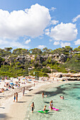 People on the beach, Cala Sa Nau, Mediterranean Sea, near Portocolom, Majorca, Balearic Islands, Spain, Europe