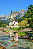 River Ramsauer Ache in front of church of Ramsau and Reiteralm i, Ramsau, Berchtesgaden, Berchtesgaden Alps, Upper Bavaria, Bavaria, Germany