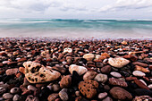 Pebbles covering beach, Hadibo, Socotra, Yemen