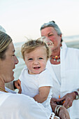 Three generations of Caucasian family on beach, Brunswick, Georgia, USA