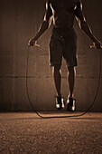 African American man jumping rope, Saint Louis, MO, USA