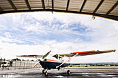 Small plane in hangar, Hilo, Hawaii, United States