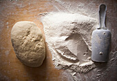 High angle view of flour and dough on table, C1