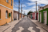 Brazil, Bahia state, Porto Seguro, street with colorful façades