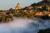 Morning fog and hill town, Todi, Umbria, Italy