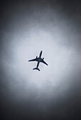 Airplane Surrounded by Cloudy Sky