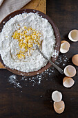 Flour and Eggs in Mixing Bowl
