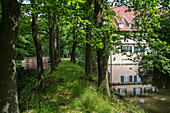 Benedictine Abbey at Burg Dinklage, forest, moat, Lower Saxony, Germany
