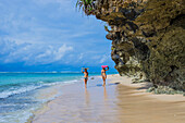 Sufer girls on the beach.