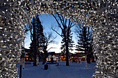 Christmas lights adorn antler arches in Jackson Wyoming's city center.
