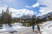 Two climbers walking in Rocky Mountain National Park, Colorado to go boulder