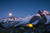 Glowing tent at dusk, White Rock Lakes along the Ptarmigan Traverse, North Cascades, Washington