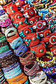 Detail of bracelets and rings at the Tibetan Market in Wednesday Flea Market in Anjuna, Goa, India, Asia