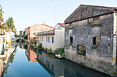 Lemene River runs through the town of Portogruaro, Veneto, Italy, Europe