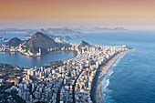 View of Ipanema and Leblon beaches, Corcovado and the Sugar Loaf at twilight, Rio de Janeiro, Brazil, South America