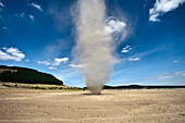 Dust whirlwind twister during summer drought on farm, Waikato, North Island, New Zealand, Pacific