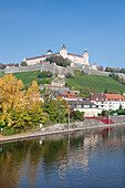 View over the Main River to Marienberg Fortress in autumn, Wuerzburg, Franconia, Bavaria, Germany, Europe