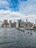 Lower Manhattan financial district skyline and East River, New York City, New York, United States of America, North America