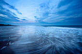 Waves at dusk on Alnmouth Beach, Northumberland, England, United Kingdom, Europe
