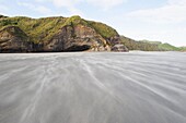 Sand being blown along windy Wharariki Beach, Golden Bay, Tasman Region, South Island, New Zealand, Pacific