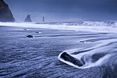 Waves rushing over black sand beach near Vik on the South coast of Iceland, Polar Regions