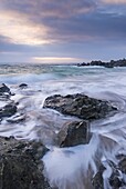 Winter sunrise at Porthgwidden Beach in St. Ives, Cornwall, England, United Kingdom, Europe