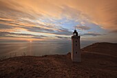 Rubjerg Knude Fyr (lighthouse) buried by sand drift at sunset, Lokken, Jutland, Denmark, Scandinavia, Europe