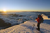 Climber on summit of Mont Blanc, Chamonix, Haute-Savoie, French Alps, France, Europe