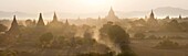 Panoramic view at sunset over the plain and temples of Bagan from Shwesandaw Paya, Bagan Central Plain, Myanmar (Burma)