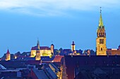 View over city at sunset with St. Lorenz, St. Sebald and the Castle in the background, Nuremberg, Bavaria, Germany, Europe