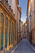 A narrow backstreet in Aix-en-Provence, Bouches-du-Rhone, Provence, France, Europe