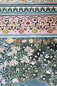 Detail of the finely painted walls in one of the bedroom suites, The Lake Palace Hotel, Udaipur, Rajasthan state, India, Asia
