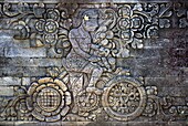 Stone relief portraying Dutch artist  W.O.J Nieuwenkamp who toured Bali by bicycle in 1904, on the temple of Meduwekarang, built in 1906, Bali, Indonesia, Southeast Asia, Asia