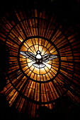 Stained glass window in St. Peter's basilica of Holy Spirit dove symbol, Vatican, Rome, Lazio, Italy, Europe