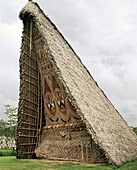 House Tamberan, or ceremonial building, photographed in 1974, only initiated warriors were allowed inside and in the days of cannibalism, a victim's head from a neighbouring tribe was hung above the entrance as a warning to those not properly initiated, M